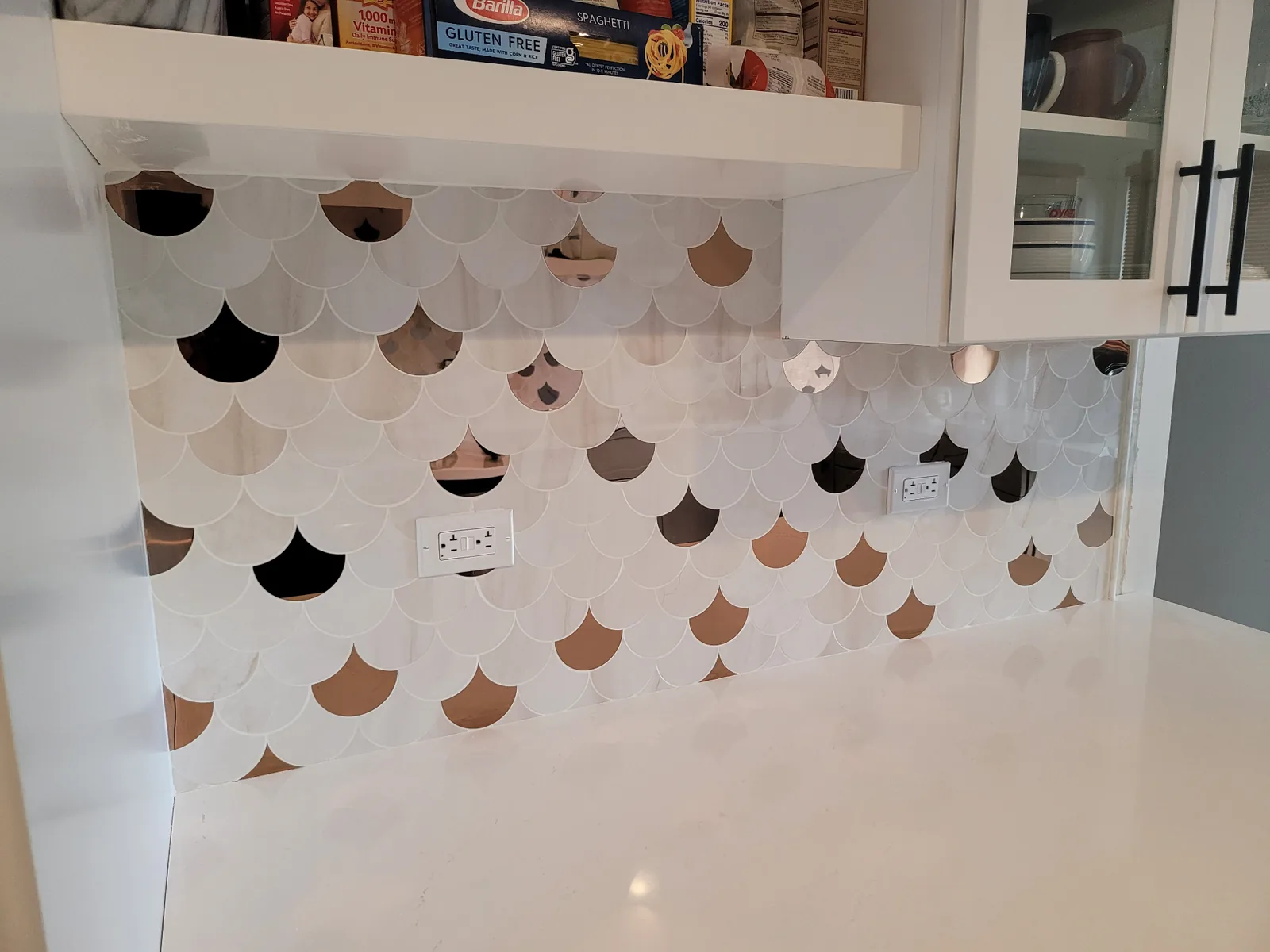 Custom tile backsplash detail by Augustine Construction Management